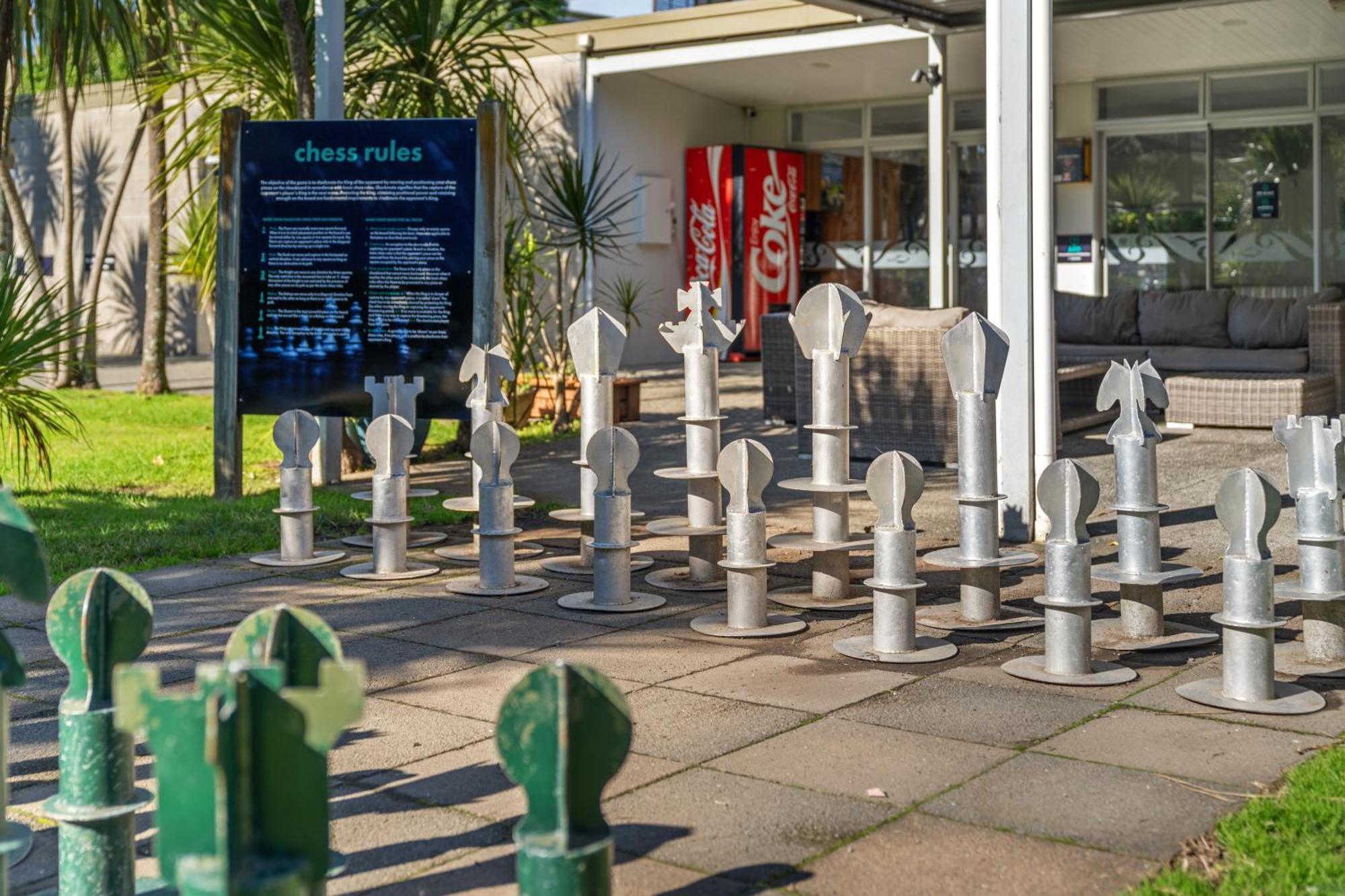 Tasman Holiday Parks - Waihi Beach Dış mekan fotoğraf Chess set at the entrance of the library